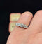 Antique 1915 five-stone diamond ring with old European cut diamonds in platinum.