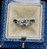 1.13ct brilliant cut diamond centre with 6 old cut diamonds on the shoulders.