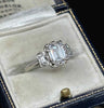 1.51ct emerald cut diamond ring E colour VS2 in platinum with baguette shoulders — GIA certified engagement ring