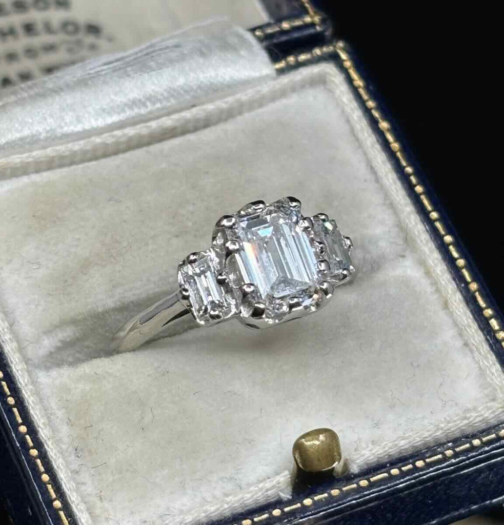 1.51ct emerald cut diamond ring E colour VS2 in platinum with baguette shoulders — GIA certified engagement ring