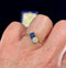 18ct gold Edwardian ring with sapphire and diamond accents.