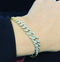 Yellow_gold_graduated_curb_link_diamond_bracelet