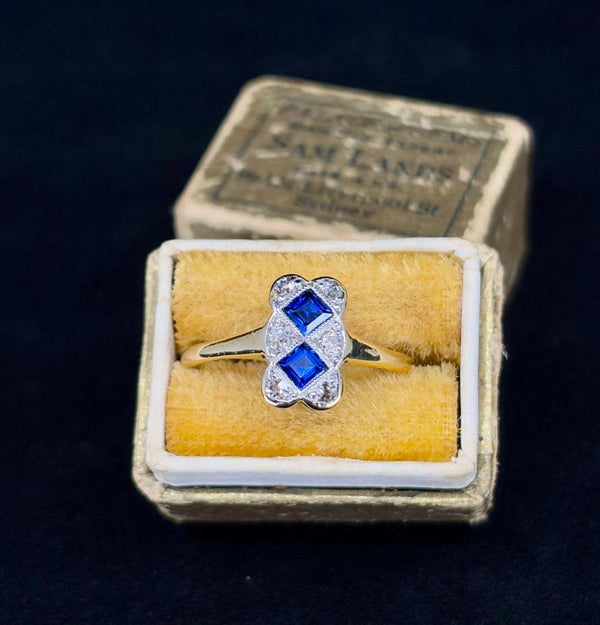 Elegant 1920s Art Deco jewelry, a sapphire and diamond ring with a rectangular cluster design set in platinum and 18ct yellow gold.