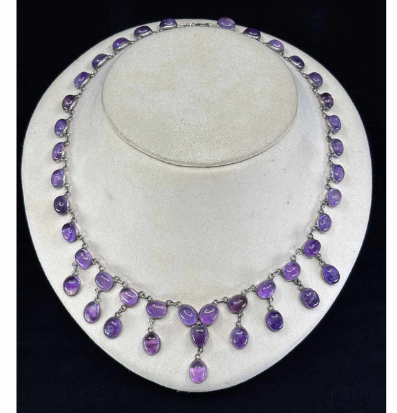 1930s sterling silver necklace with oval amethyst cabochons and articulated drop fringe