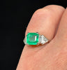 1930s Art Deco vintage emerald engagement ring, 1.25ct center emerald with G-colour shield and baguette diamonds.