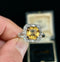 1930s topaz and diamond cluster ring showcasing a rich golden yellow topaz.