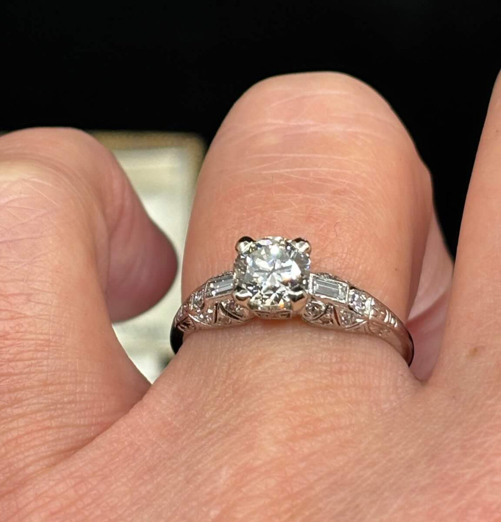 1930s antique diamond engagement ring 1.25ct with classic Art Deco geometric lines and pavé detail.
