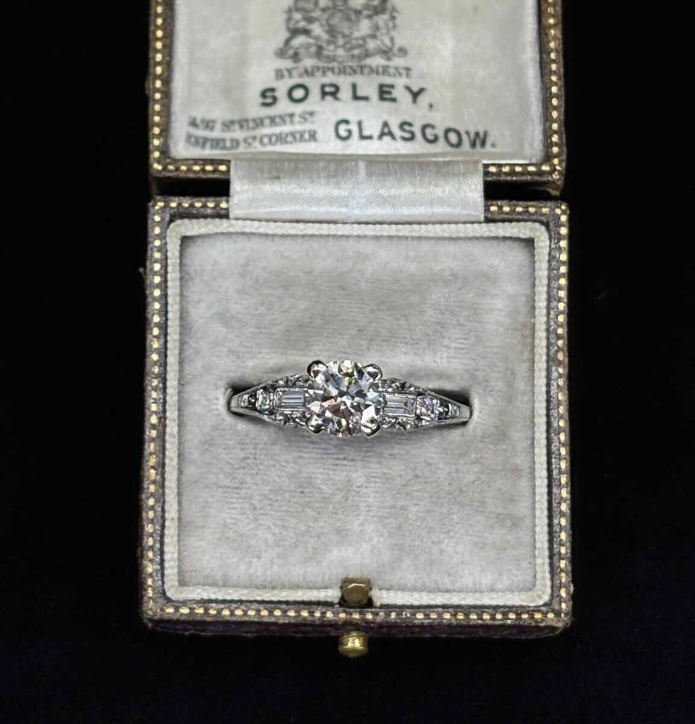 1930s Art Deco 1.25ct diamond ring presented in antique ring box, platinum setting with baguette and pavé set diamonds.