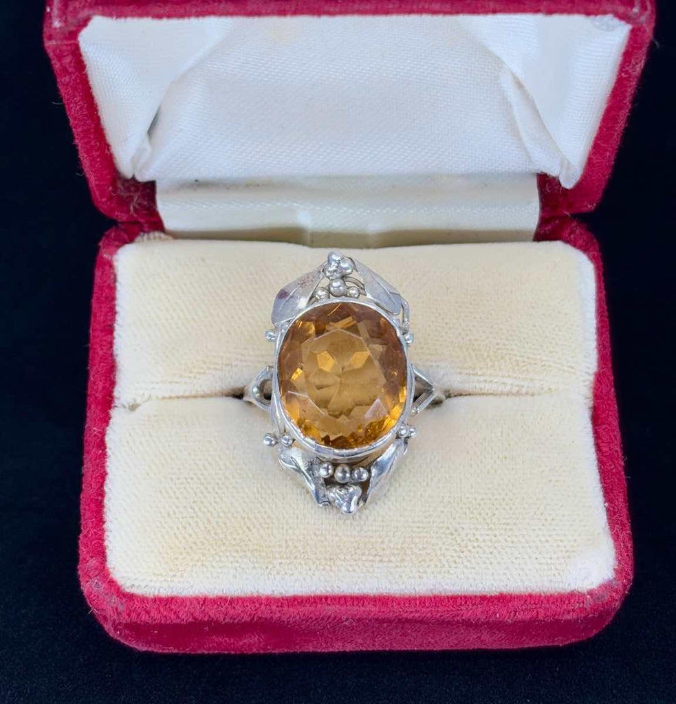 The very fine citrine complements the silver surround of the Australian outback bush motif of gumleafs which have been superbly handcrafted.