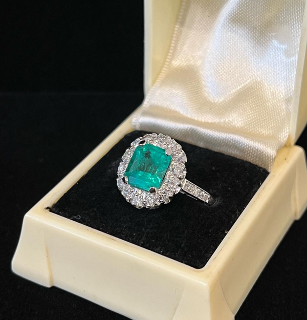1950s_vintage_emerald_cut_emerald_cluster_ring