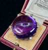Exquisite 19th-century Russian amethyst brooch featuring diamonds and gold craftsmanship.