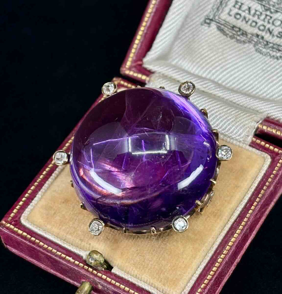 Exquisite 19th-century Russian amethyst brooch featuring diamonds and gold craftsmanship.