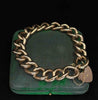 Reverse view of the antique Victorian rose gold bracelet showing polished curb links and heart padlock clasp