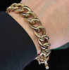Antique Victorian rose gold bracelet worn on the wrist, highlighting alternating polished and hand-engraved curb links