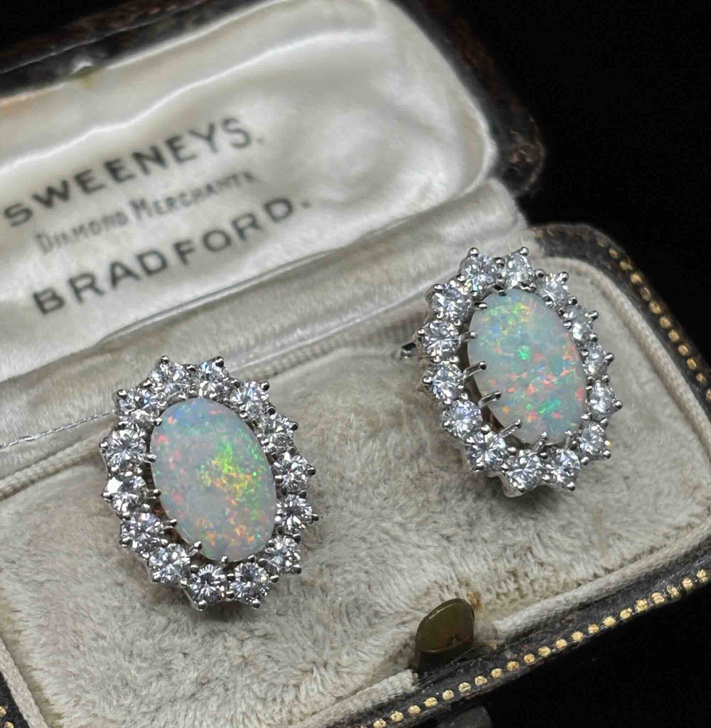 Austrian 1960s solid opal and diamond earrings, angled detail view