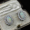 Austrian 1960s solid opal and diamond earrings, angled detail view
