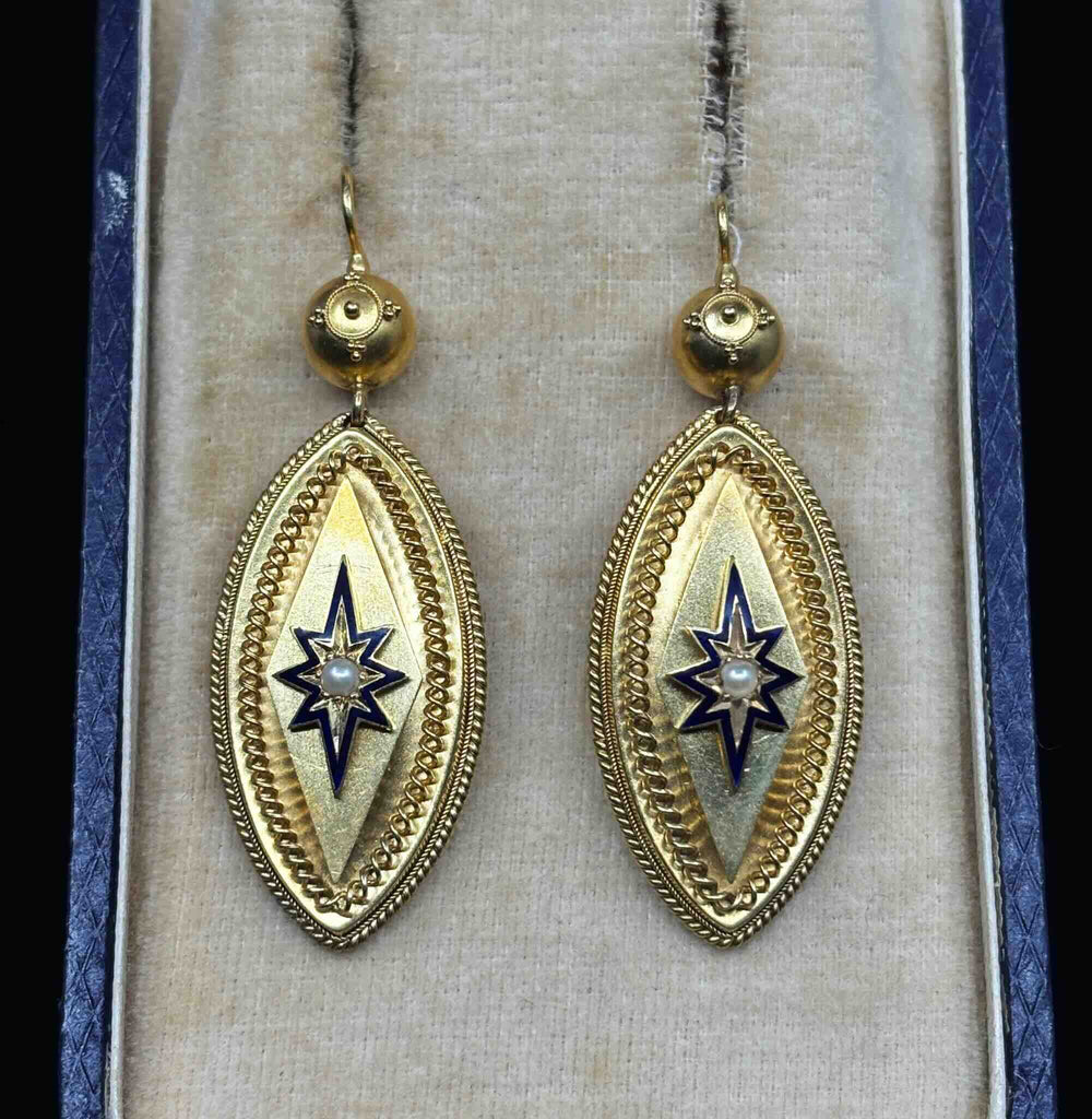 Pair of Victorian 15ct yellow gold navette drop earrings with blue enamel starbursts and natural seed pearl centres