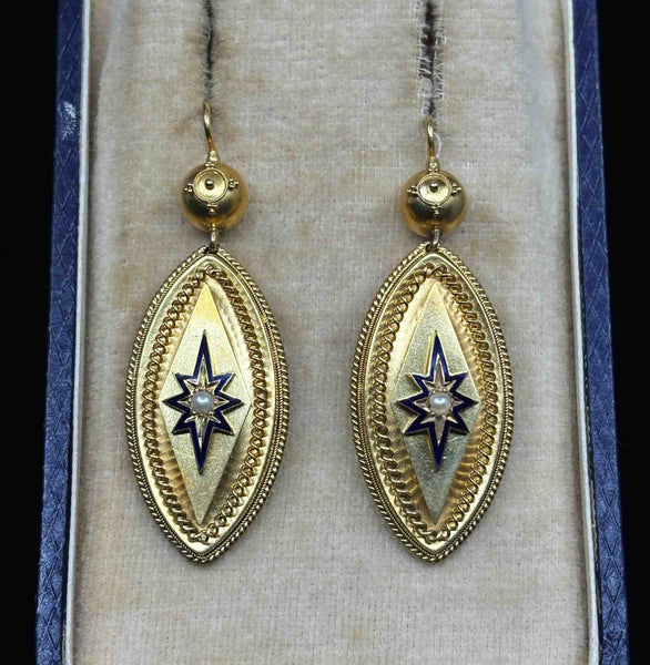 Pair of Victorian 15ct yellow gold navette drop earrings with blue enamel starbursts and natural seed pearl centres
