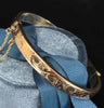 Interior view of contemporary 9ct yellow gold hinged bangle construction.