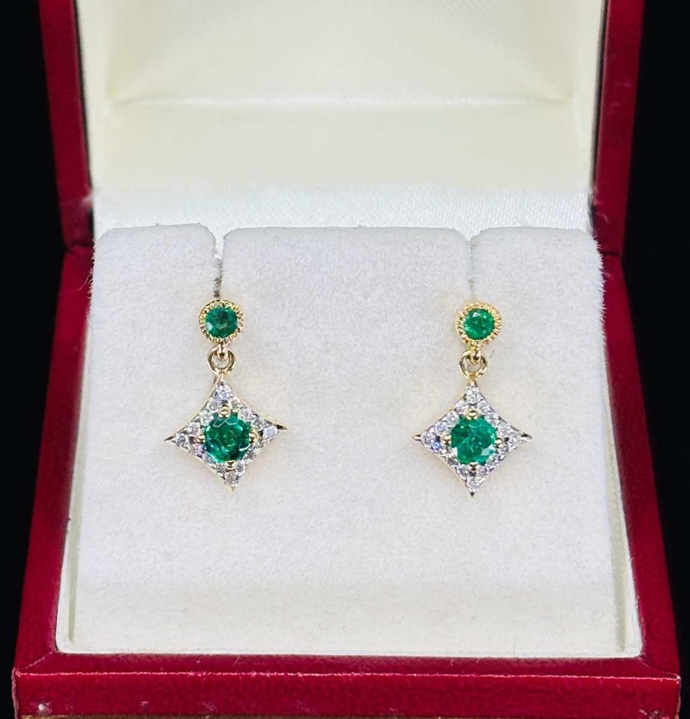 Earrings crafted in 9ct yellow gold with emeralds and diamonds.