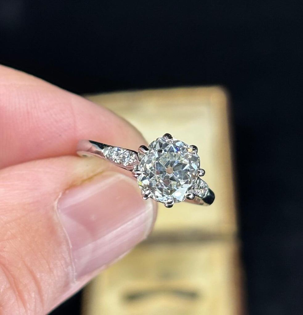 A close up of the spectacular antique 1920s old mine cut diamond up close featuring the 2.45ct diamond