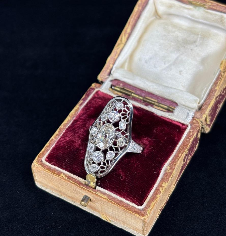 Elegant antique diamond openwork ring in Art Deco style, perfect for collectors and enthusiasts.
