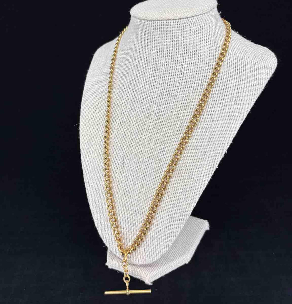 Antique Edwardian 18k Albert chain, 56cm in length, showcasing elegant craftsmanship.