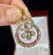 Antique Victorian pendant showcasing rose cut diamonds with ruby accents.