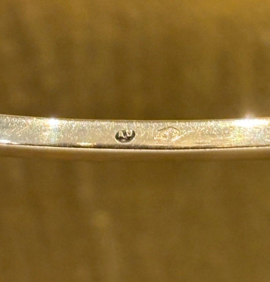 Close up of Anton Deutsch jewellers mark inside the bangle with mark from Vienna, Austria circa 1880.