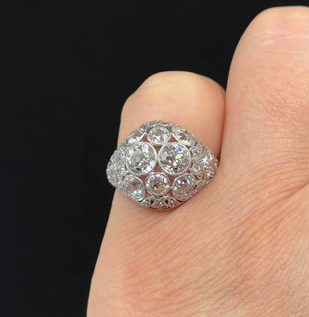 Art Deco Platinum 3.59ct Diamond Cluster Ring worn on the finger to show its size and proportion.