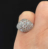 Art Deco Platinum 3.59ct Diamond Cluster Ring worn on the finger to show its size and proportion.