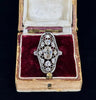 Vintage Art Deco diamond ring with openwork plaque style, showcasing exquisite craftsmanship.