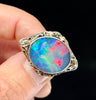 Artisan Australian opal brooch by Rhoda Wager with beautiful leaf design, reflecting nature-inspired craftsmanship.