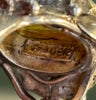Internal marking of Rhoda Wager stating WAGER in silver underneath citrine bezel.