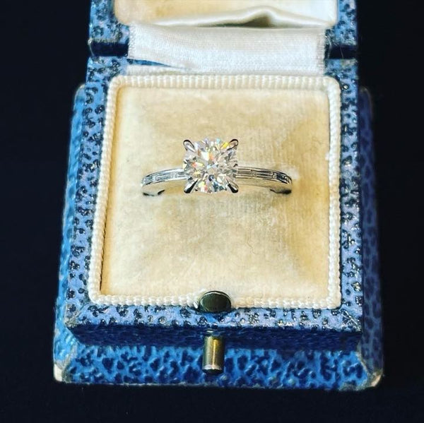 Brilliant_Cut_1.30ct_Diamond_and_Sapphire_Engagement_Ring