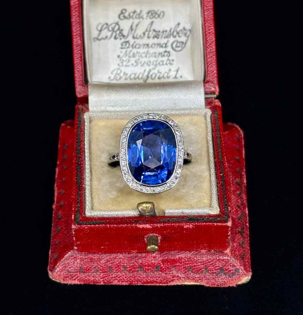 Antique French platinum sapphire ring from circa 1910 with a cushion cut deep blue Ceylon sapphire and diamonds.