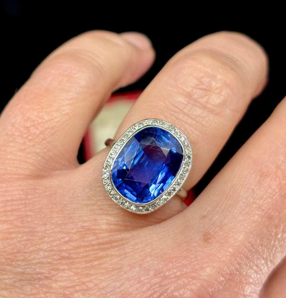 Vintage 1910 Ceylon sapphire and diamond ring, notable for its no heat treatment deep blue sapphire centerpiece.
