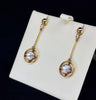 Elegant moonstone drop earrings in 9ct yellow gold, reflecting antique style and craftsmanship from the 1920s.
