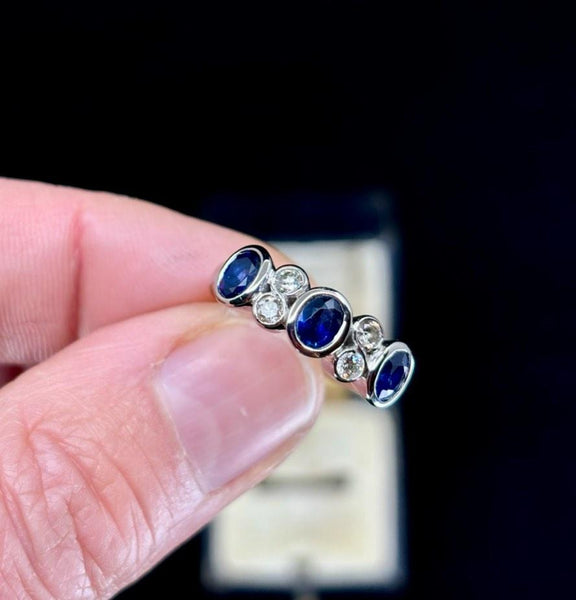 Elegant_18ct_White_Gold_Ring_with_Oval_Sapphires_and_Diamonds