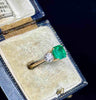 Emerald cut emerald ring from the 1950s, representing vintage jewelry style.