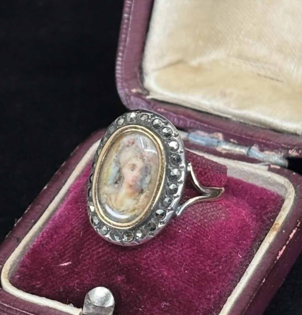 Antique portrait ring with a rock crystal centre and marcasite stones, illustrating the artistry of the Georgian era.