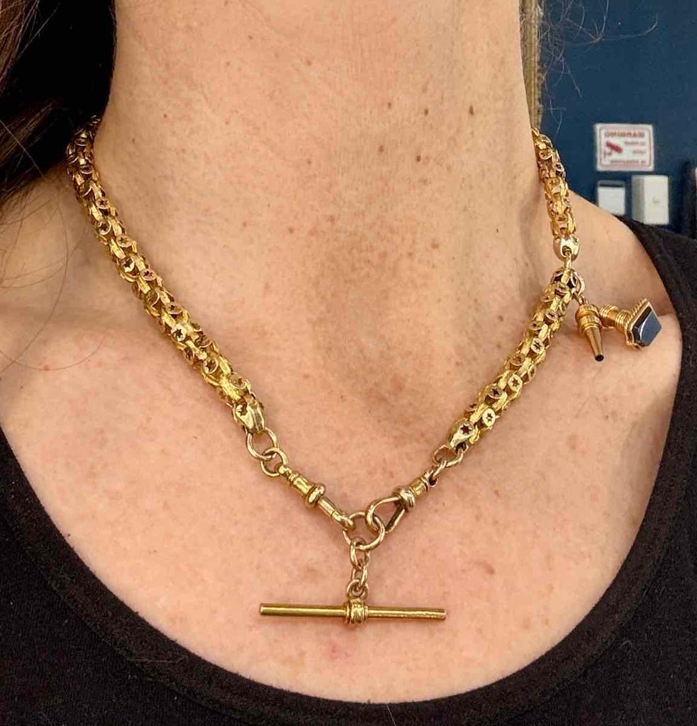 Victorian T-Bar chain with fancy star link pattern in 15ct yellow gold.