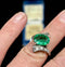 Luxurious ring showcasing a 3.25ct emerald with unique natural inclusions