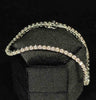 Luxury diamond line bracelet crafted in 18ct white gold, showcasing sparkling diamonds.