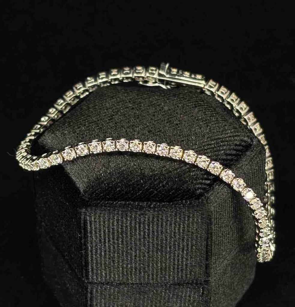 Luxury diamond line bracelet crafted in 18ct white gold, showcasing sparkling diamonds.