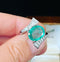 Oval 3.25ct Cut Emerald and Diamond Cross Over Ring