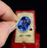 An Edwardian sapphire and diamond cushion cluster ring featuring a 10.48ct Ceylon sapphire set in platinum, surrounded by 38 old single cut diamonds.