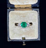 Stunning vintage emerald and diamond ring from the 1950s, handcrafted in elegant design.