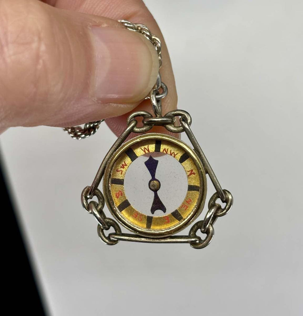 Stylish Edwardian compass fob pendant, ideal for layering with chains or wearing as a statement piece, celebrating the spirit of adventure and timeless craftsmanship.