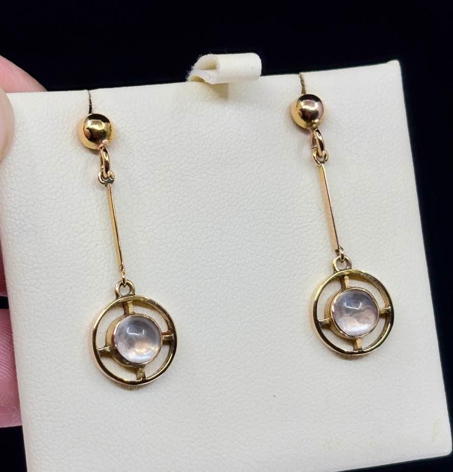 Vintage handmade moonstone earrings from the 1920s, showcasing an elegant Art Deco style with 9ct yellow gold settings.